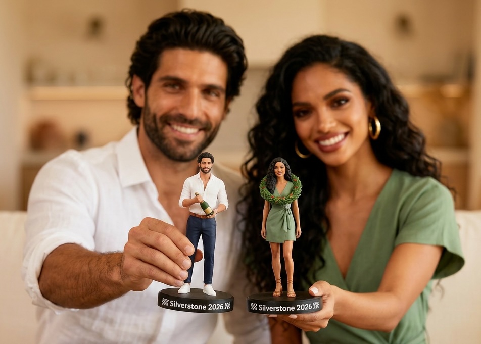 Couple holding their 3D-printed figurines